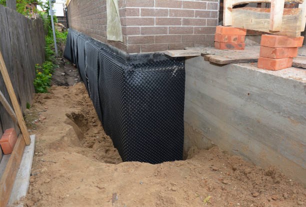Happy homeowners after waterproofing job in Waukesha